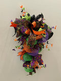 Handmade Halloween teardrop door hanger with bats and ribbon