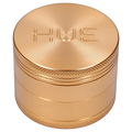 Front view of the Hue 3-Stage Grinder in champagne gold, showcasing its cylindrical, multi-tiered design.