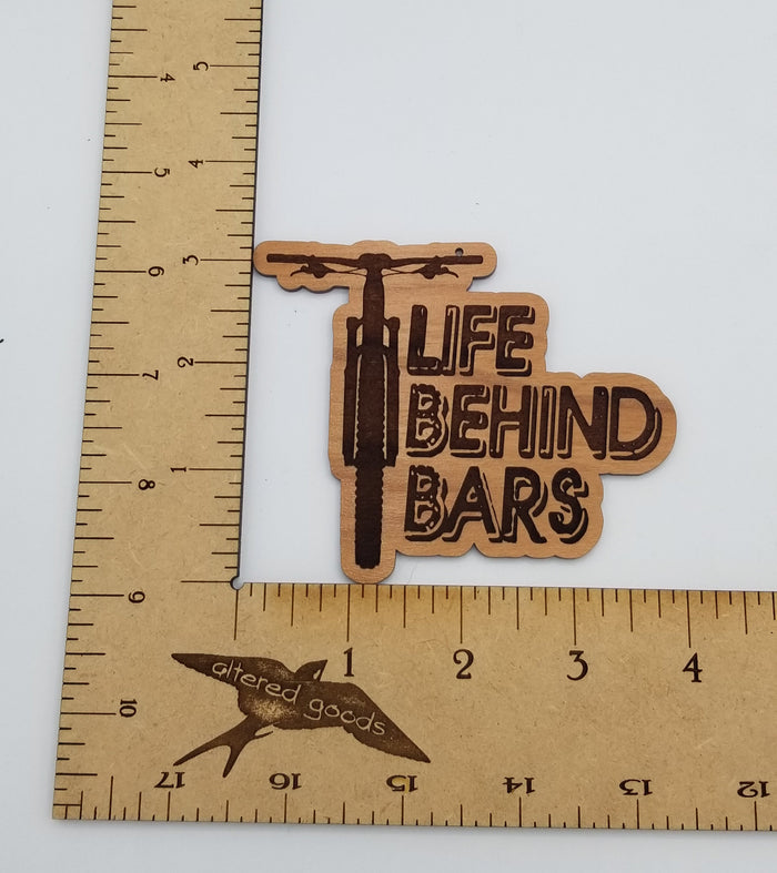 Life behind bars mountain bike laser engraved cherry wood christmas ornament